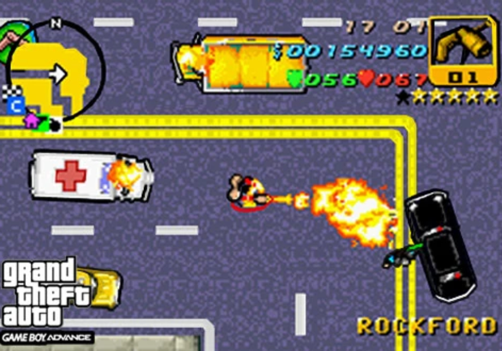 Top-down pixel art scene in GTA Advance with a player using a flamethrower next to an ambulance on Game Boy Advance